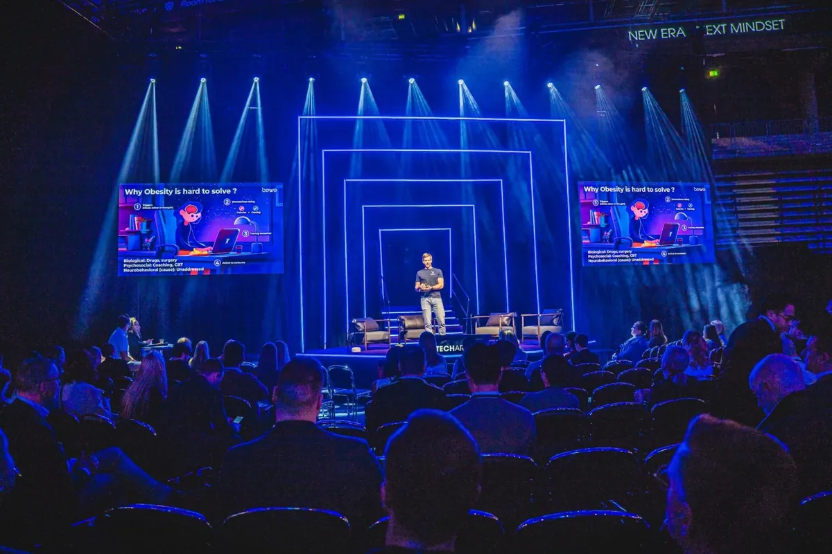 Barnabé Delarze presenting on the TechArena 2026 stage in front of an audience